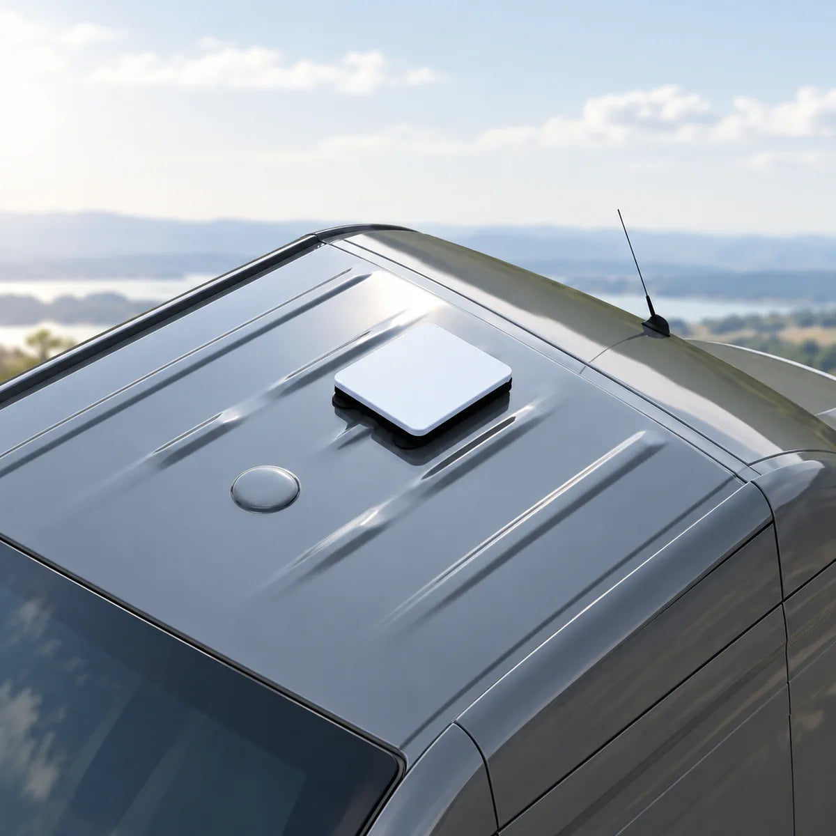 Starlink Mini protective case placed on a compatible metal vehicle roof with magnetic mounting bases.
