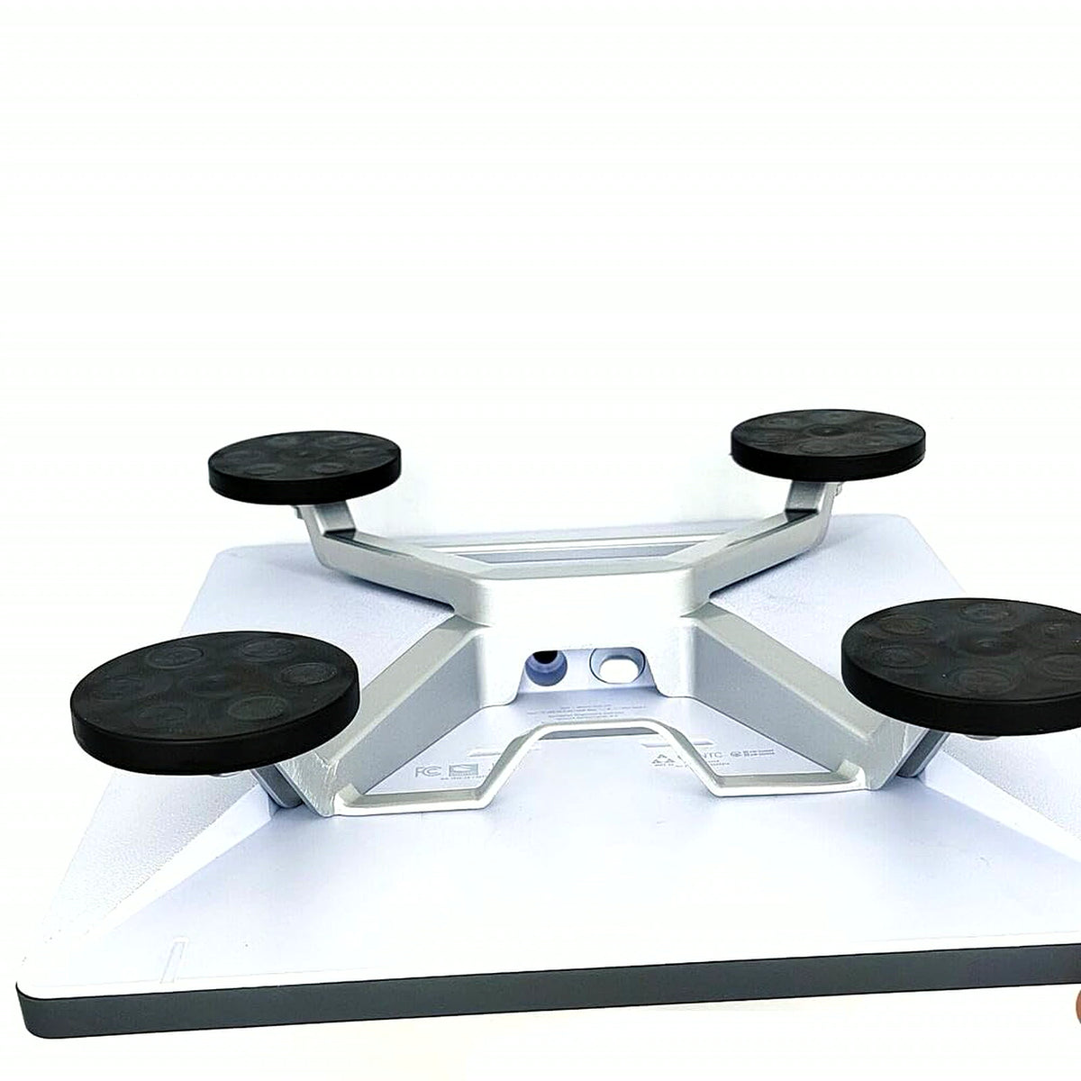 Low-angle profile of the X-frame magnetic roof mount for Starlink Mini V4