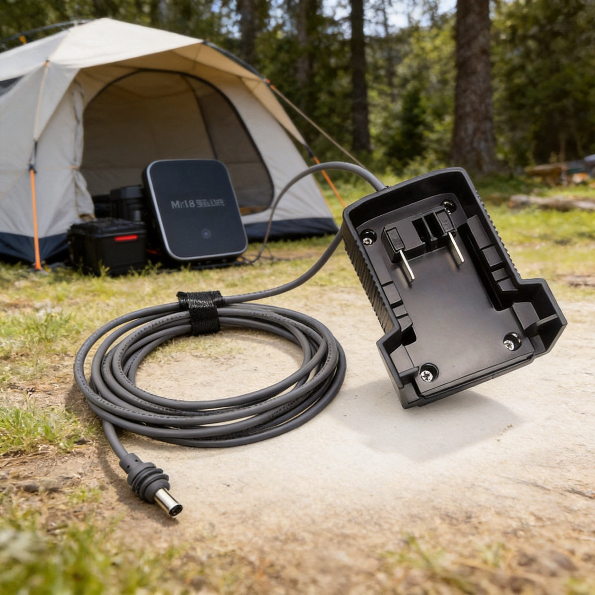 M18-compatible DC5521 power cable and battery socket shown in a campsite setup for Starlink Mini